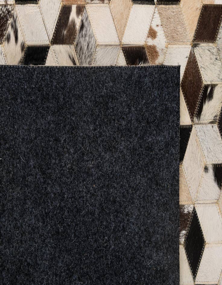 Detail image of  5' 1 x 7' 10 Cowhide - Patchwork Rug