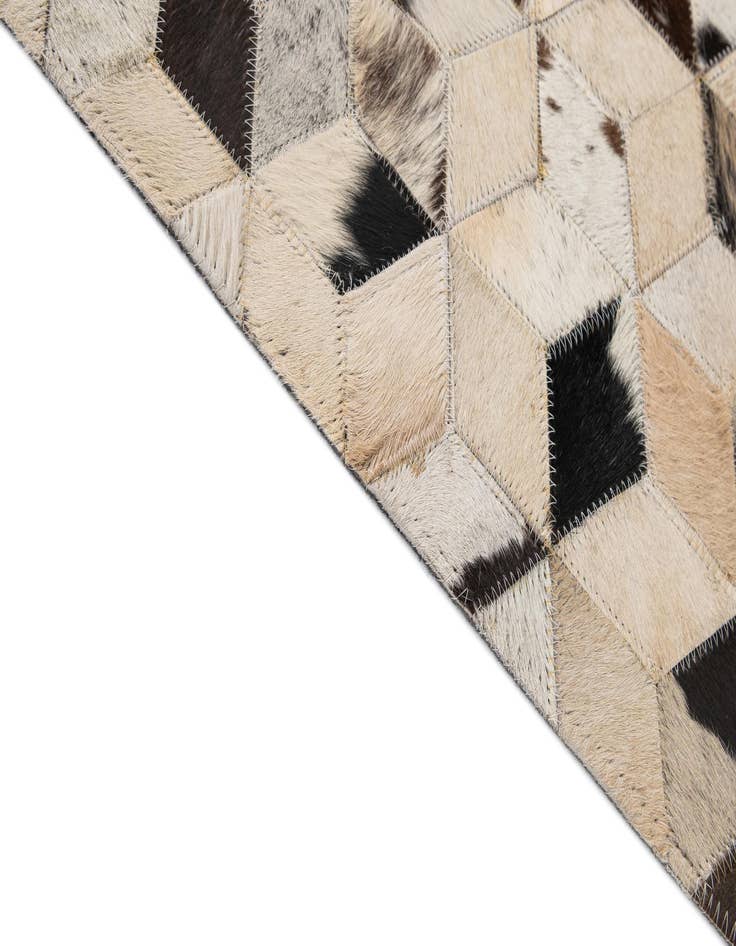 Detail image of  5' 1 x 7' 11 Cowhide - Patchwork Rug