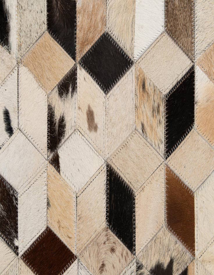 Detail image of  5' 1 x 7' 11 Cowhide - Patchwork Rug