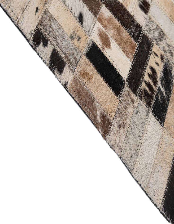 Detail image of  5' x 7' 11 Cowhide - Patchwork Rug