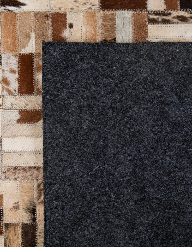 Detail image of  5' x 7' 11 Cowhide - Patchwork Rug