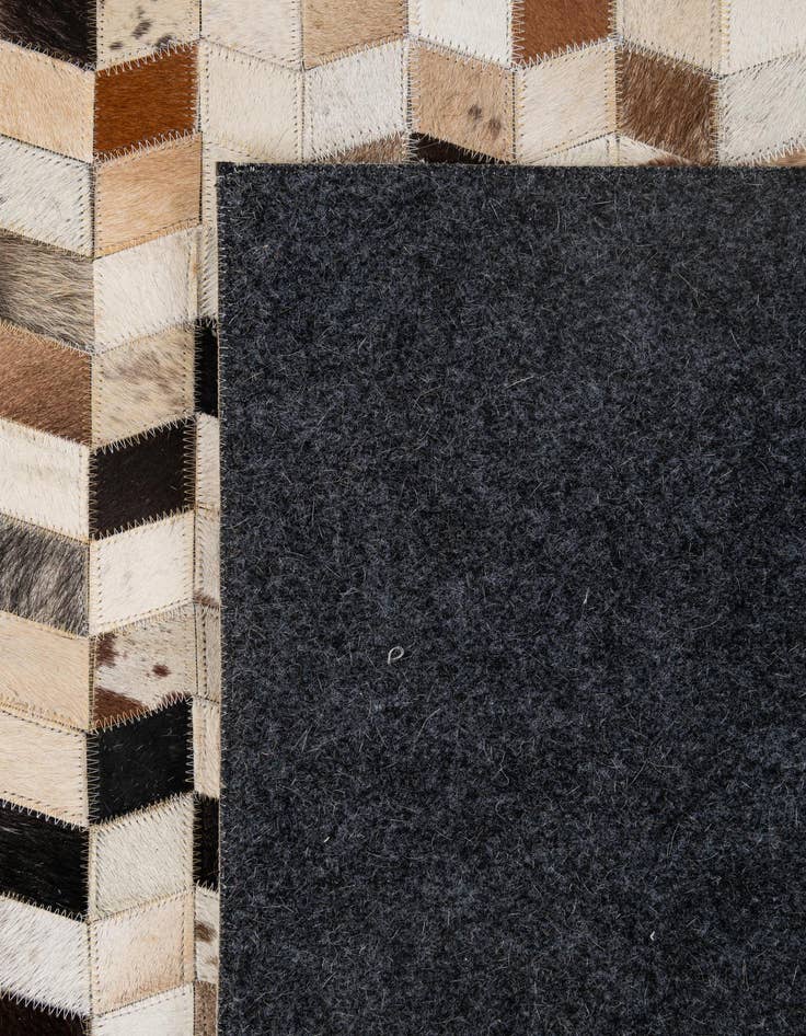 Detail image of  5' x 7' 11 Cowhide - Patchwork Rug