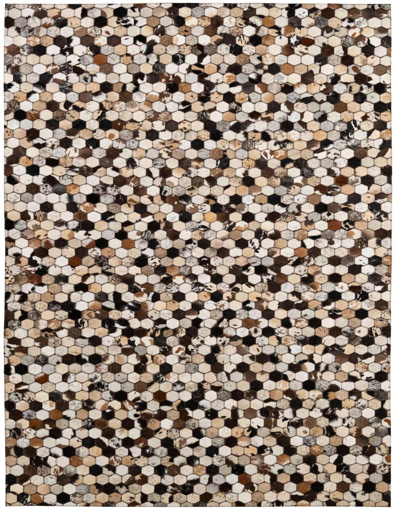 A rectangular 5x8 multi-colored cowhide rug with a modern hexagonal patchwork pattern, ideal for a living room.