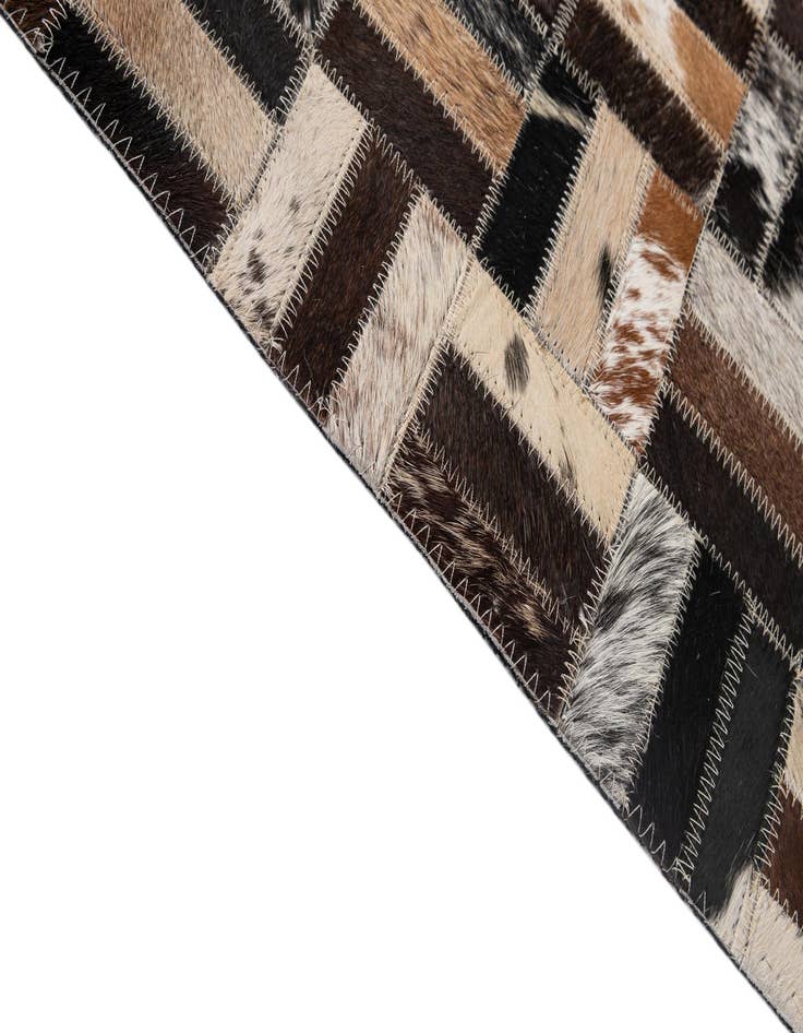 Detail image of  5' 1 x 8' Cowhide - Patchwork Rug