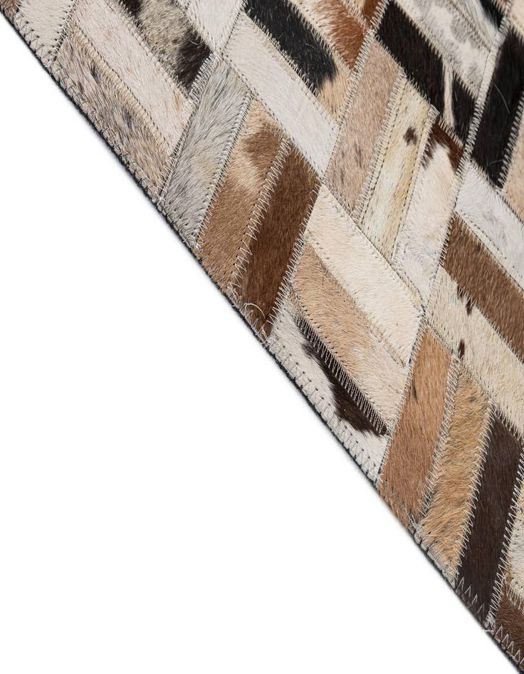 Detail image of  5' 1 x 8' 1 Cowhide - Patchwork Rug