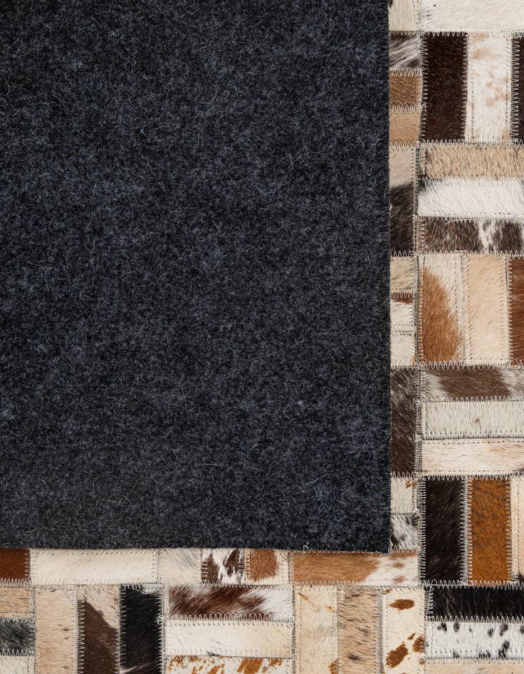 Detail image of  5' 1 x 8' 1 Cowhide - Patchwork Rug
