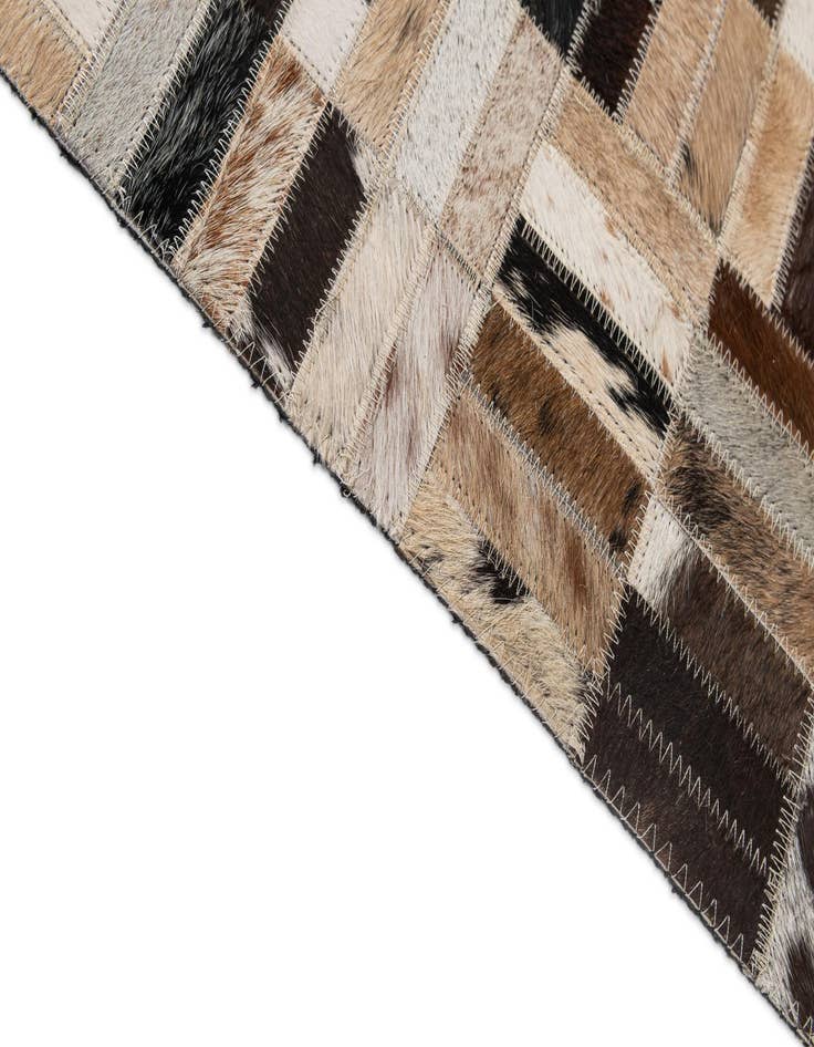 Detail image of  5' x 7' 11 Cowhide - Patchwork Rug