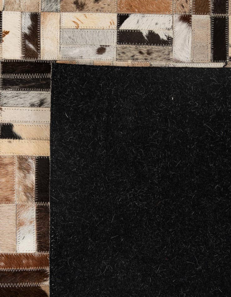 Detail image of  5' x 7' 11 Cowhide - Patchwork Rug