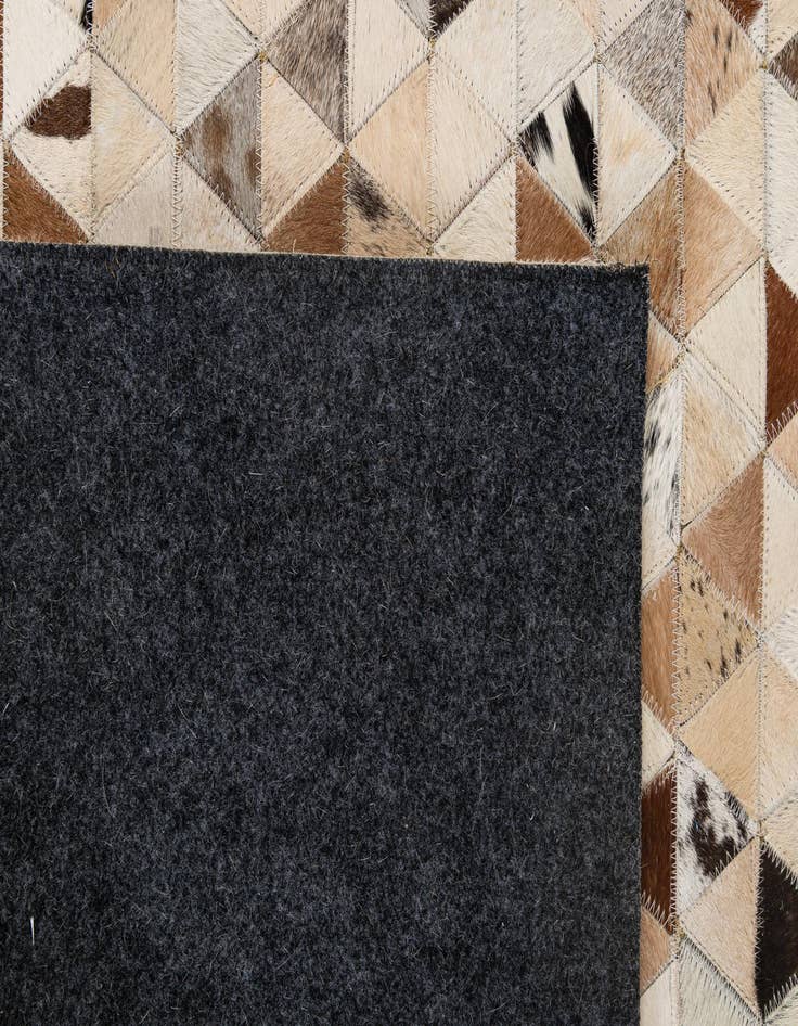 Detail image of  5' 1 x 7' 11 Cowhide - Patchwork Rug