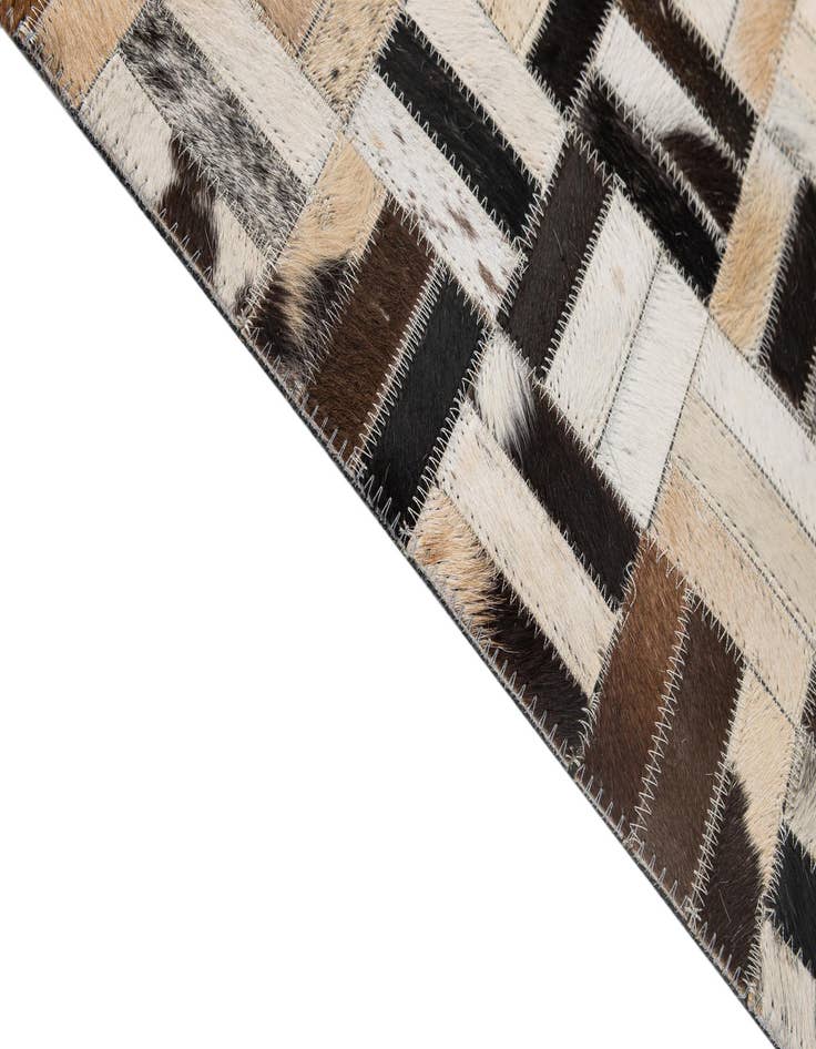 Detail image of  5' 1 x 8' Cowhide - Patchwork Rug