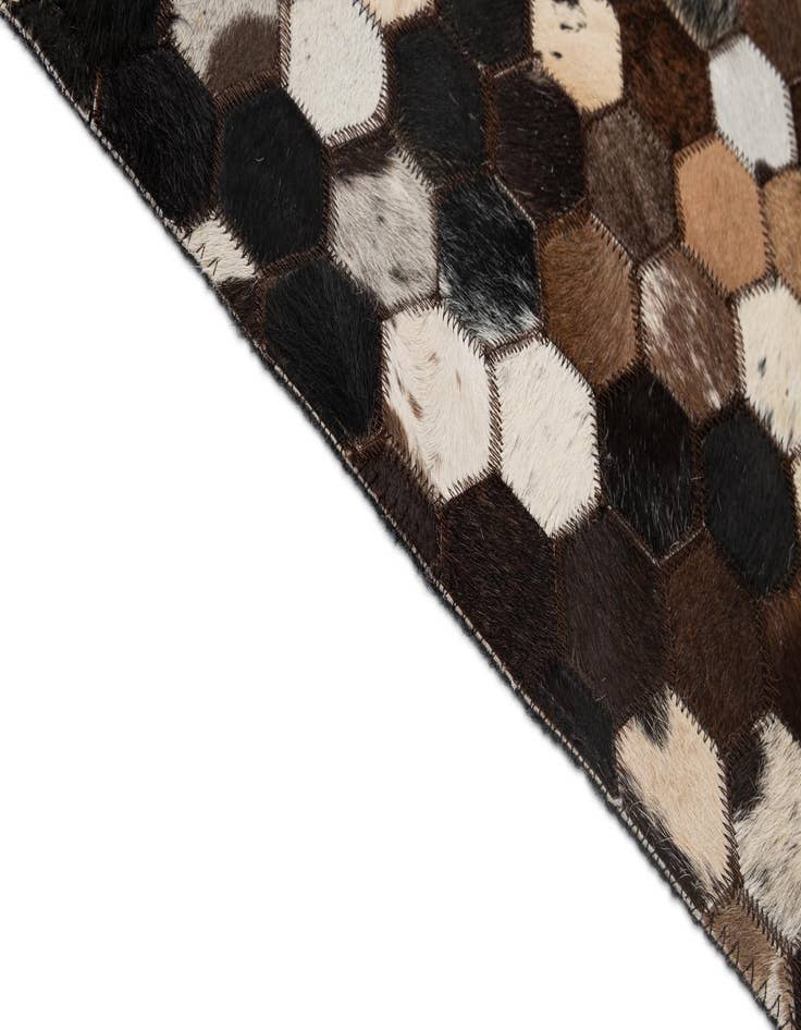 Detail image of  5' 2 x 8' Cowhide - Patchwork Rug