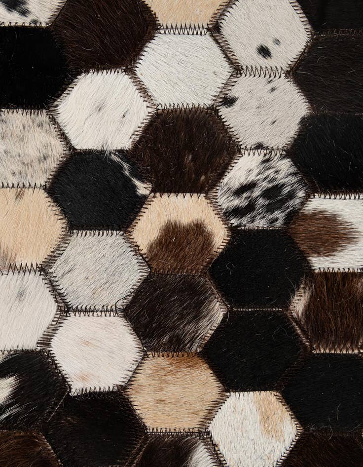 Detail image of  5' 2 x 8' Cowhide - Patchwork Rug
