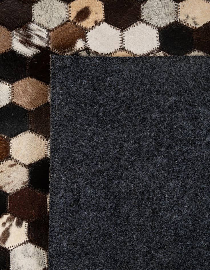 Detail image of  5' 2 x 8' Cowhide - Patchwork Rug