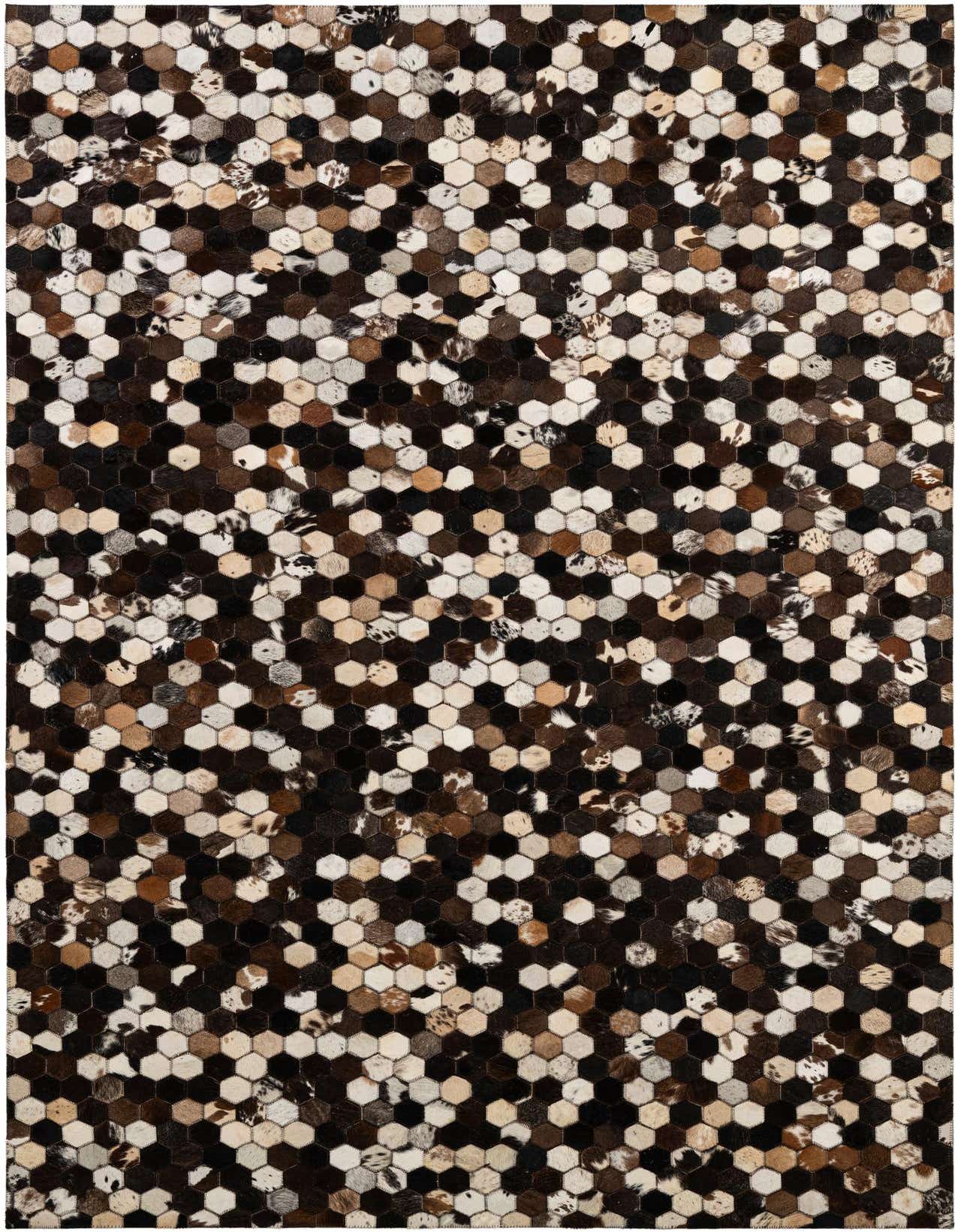 A 5x8 rectangular Cowhide Patchwork rug featuring a modern geometric pattern of multi-colored hexagon-shaped cowhide pieces in various shades of brown, black, and white.