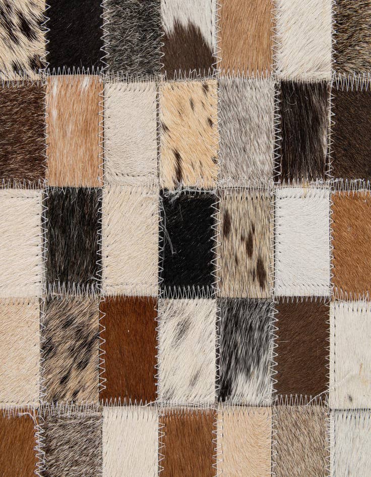 Detail image of  5' 1 x 7' 10 Cowhide - Patchwork Rug