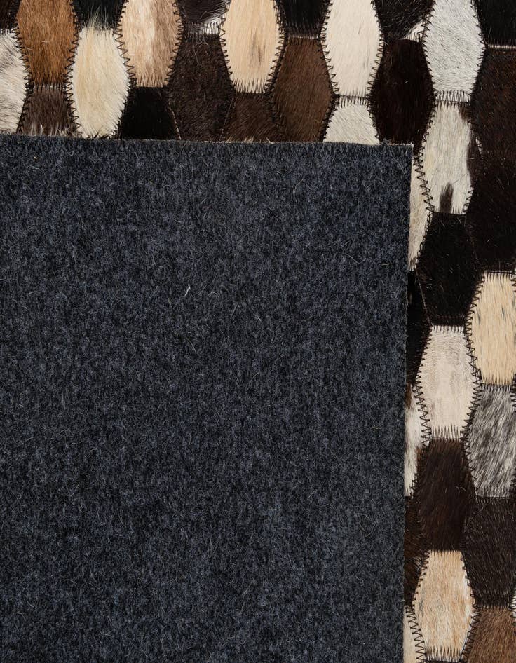 Detail image of  5' 1 x 8' Cowhide - Patchwork Rug