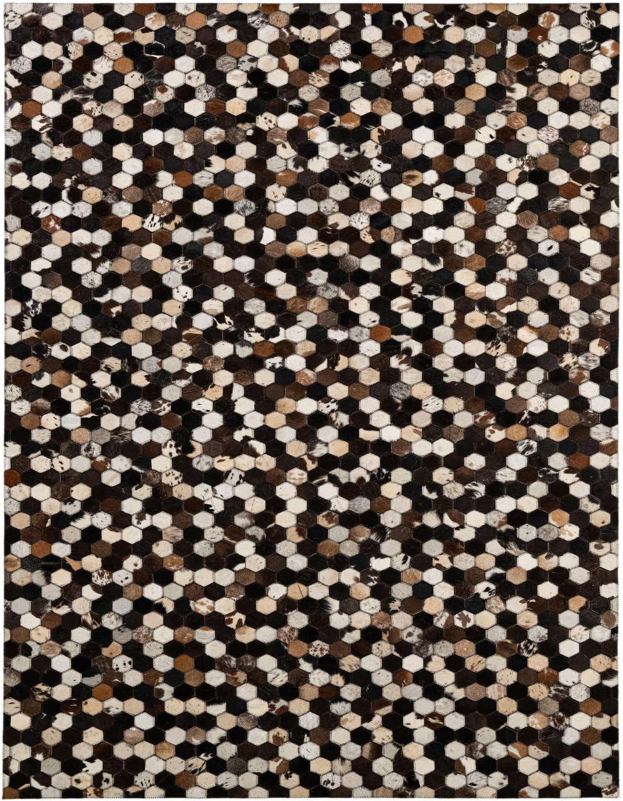 A 5x8 rectangular Cowhide Patchwork rug featuring a modern hexagonal pattern in various shades of brown, black, and white.