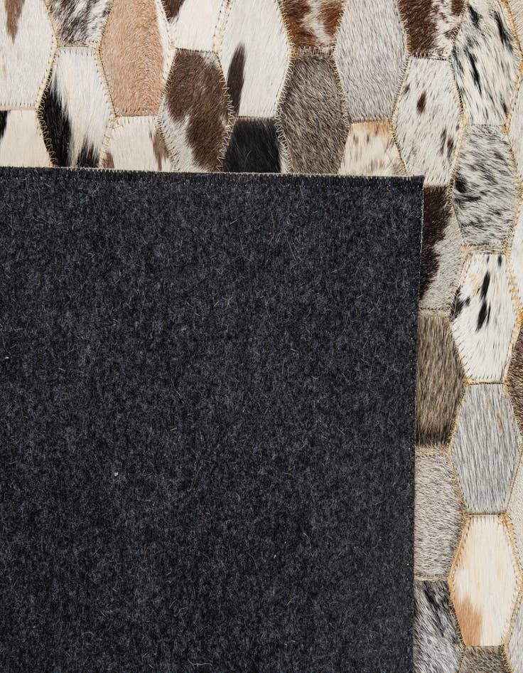 Detail image of  5' x 7' 11 Cowhide - Patchwork Rug