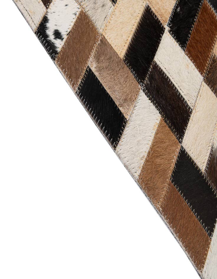 Detail image of  5' x 7' 11 Cowhide - Patchwork Rug