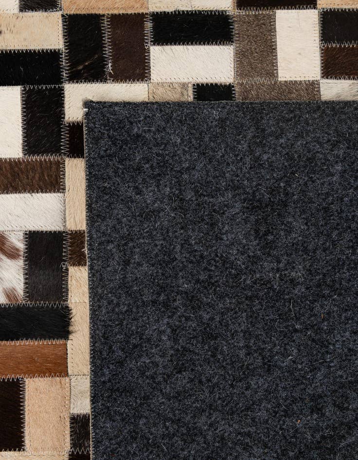 Detail image of  5' x 7' 11 Cowhide - Patchwork Rug
