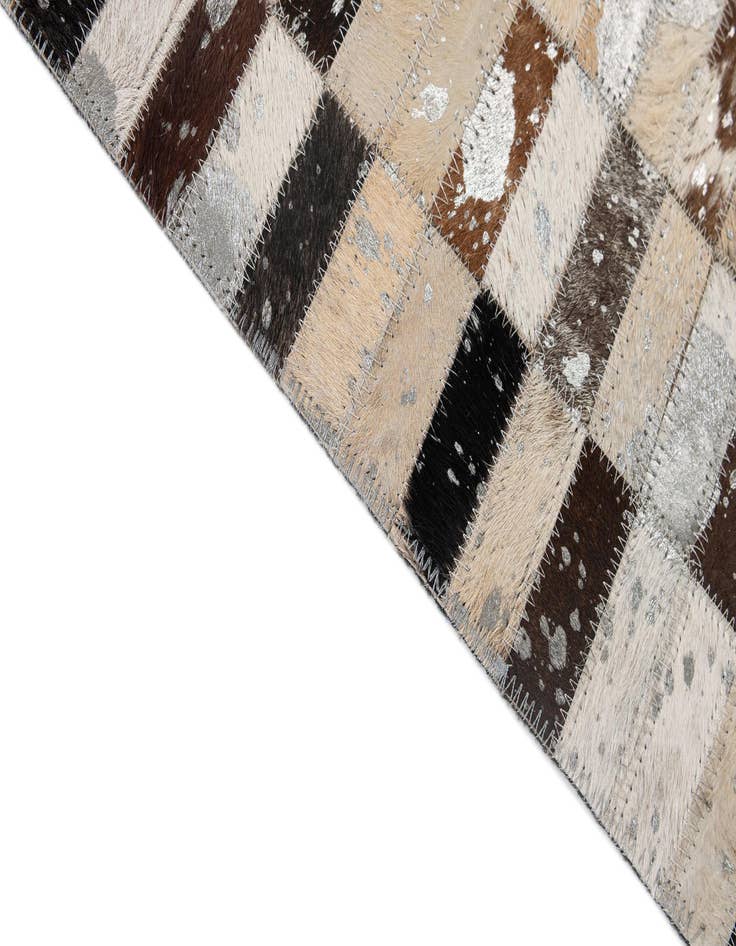 Detail image of  5' 2 x 7' 11 Cowhide - Patchwork Rug