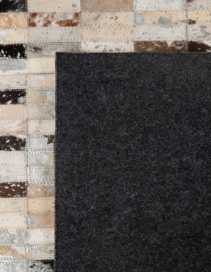 Detail image of  5' 2 x 7' 11 Cowhide - Patchwork Rug