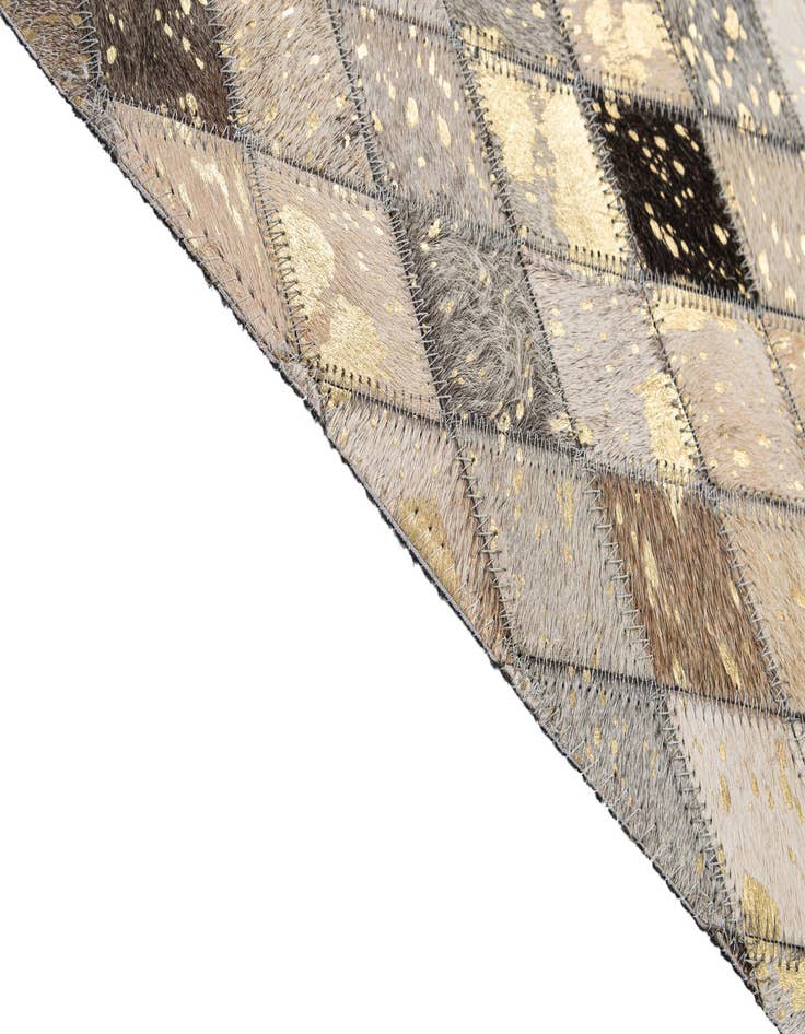 Detail image of  5' 1 x 7' 9 Cowhide - Patchwork Rug