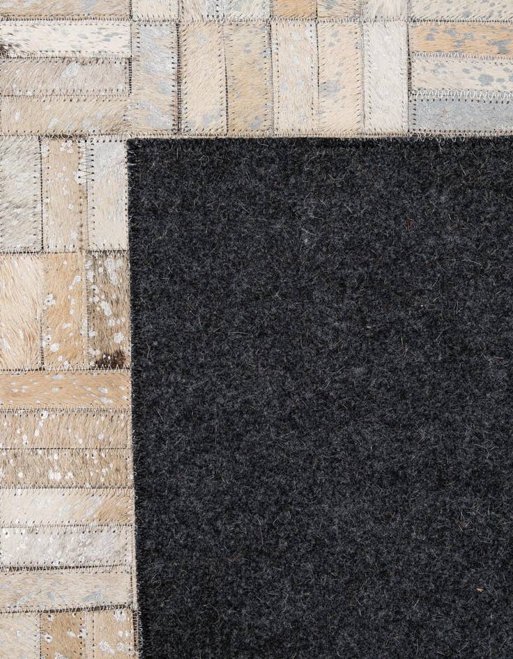 Detail image of  5' 1 x 7' 10 Cowhide - Patchwork Rug