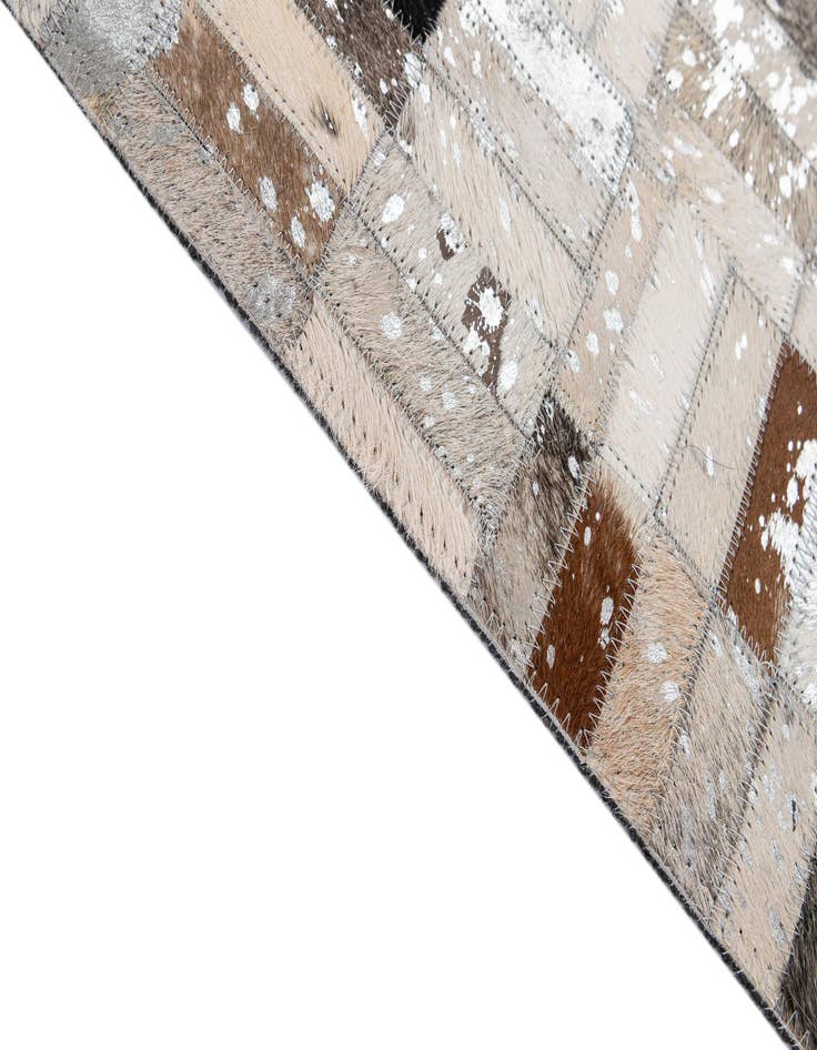 Detail image of  5' 1 x 7' 11 Cowhide - Patchwork Rug