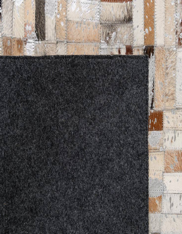Detail image of  5' 1 x 7' 11 Cowhide - Patchwork Rug