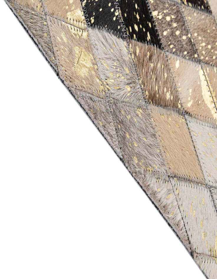 Detail image of  5' 1 x 7' 11 Cowhide - Patchwork Rug
