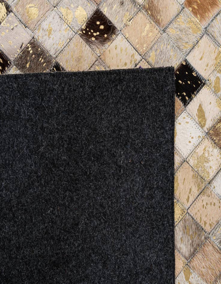 Detail image of  5' 1 x 7' 11 Cowhide - Patchwork Rug