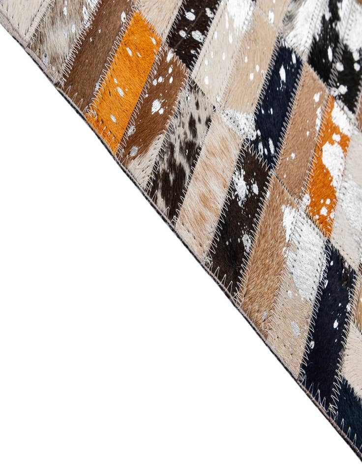 Detail image of  5' 2 x 8' 2 Cowhide - Patchwork Rug