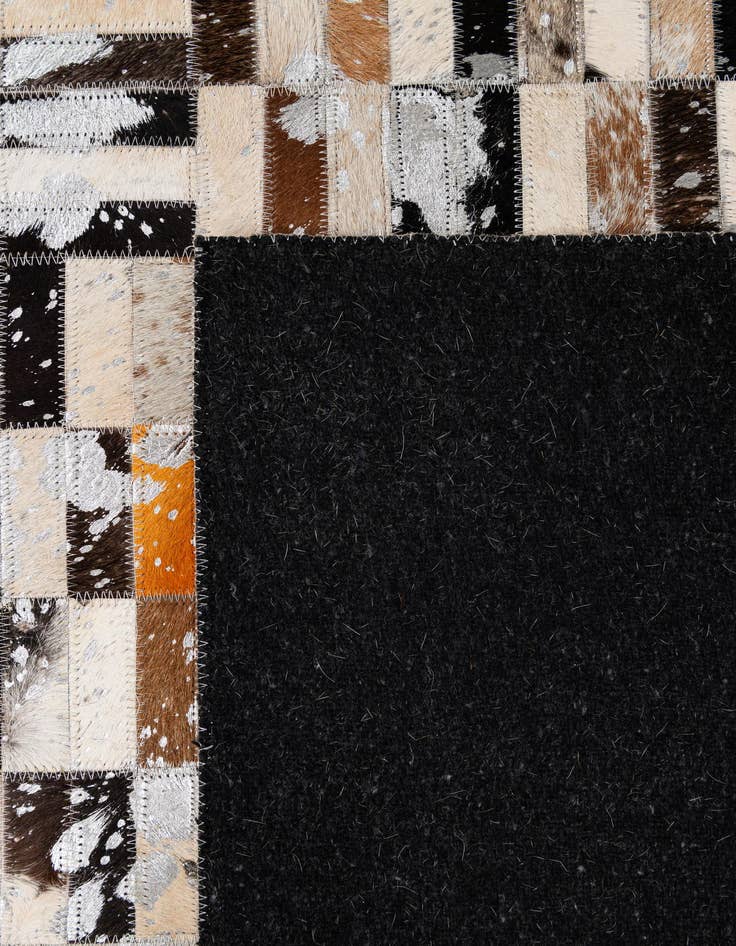 Detail image of  5' 2 x 8' 2 Cowhide - Patchwork Rug