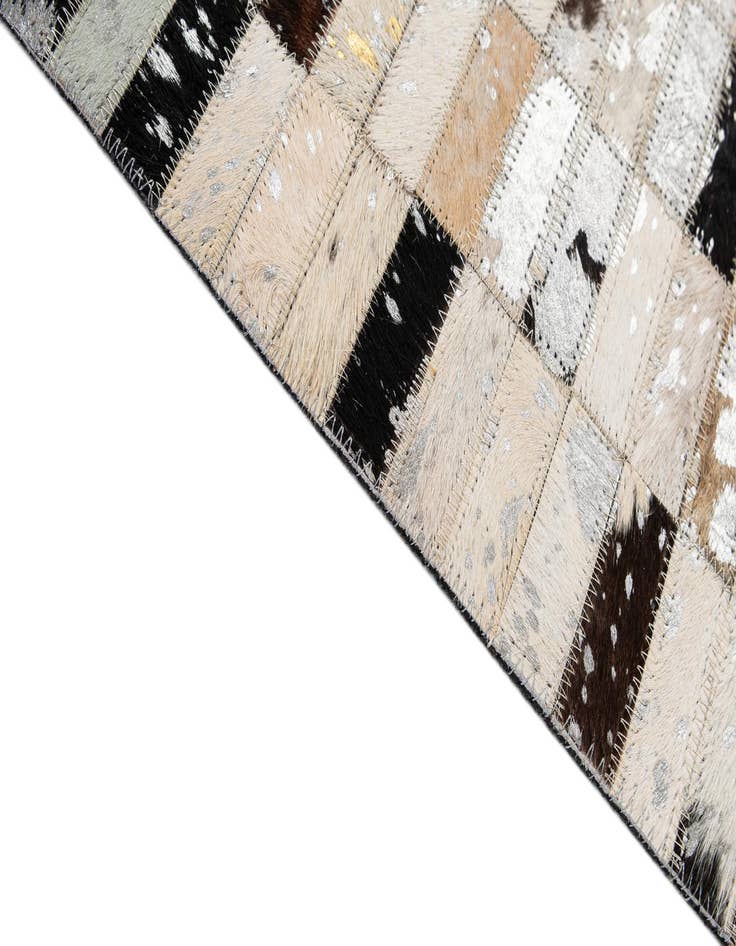 Detail image of  5' x 7' 11 Cowhide - Patchwork Rug