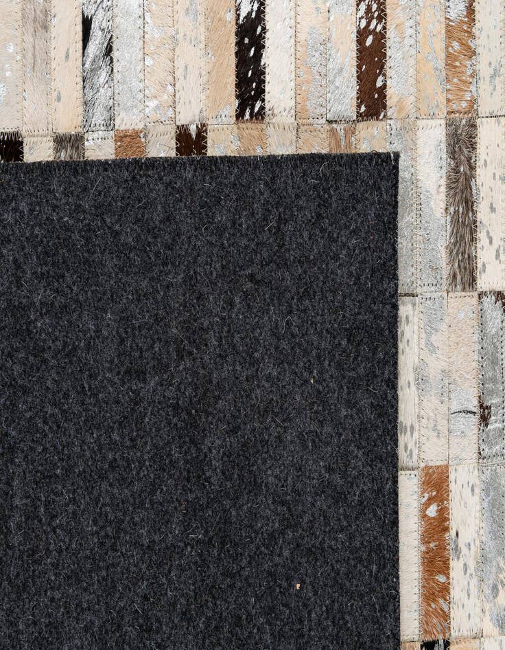 Detail image of  5' x 7' 11 Cowhide - Patchwork Rug