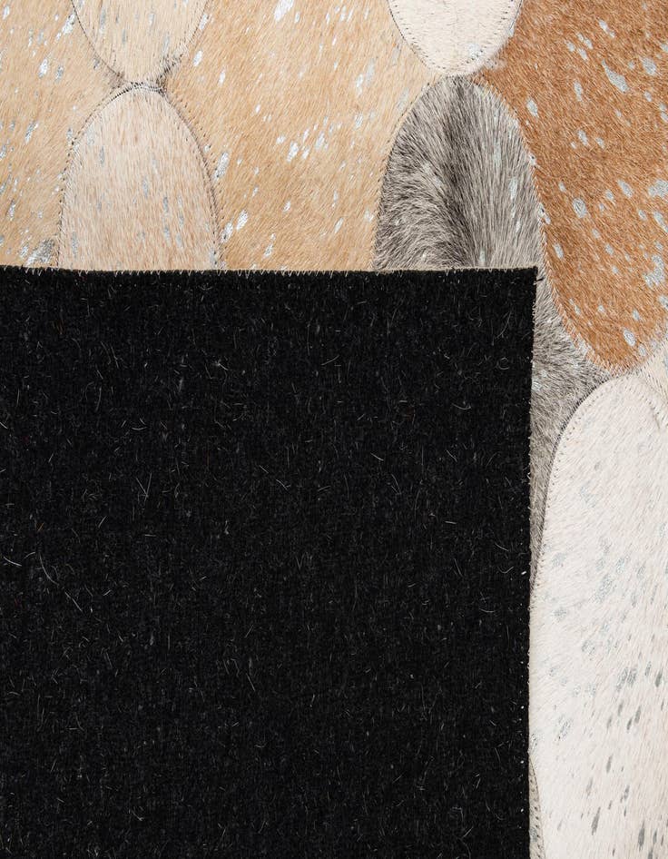Detail image of  5' 1 x 8' 4 Cowhide - Patchwork Rug