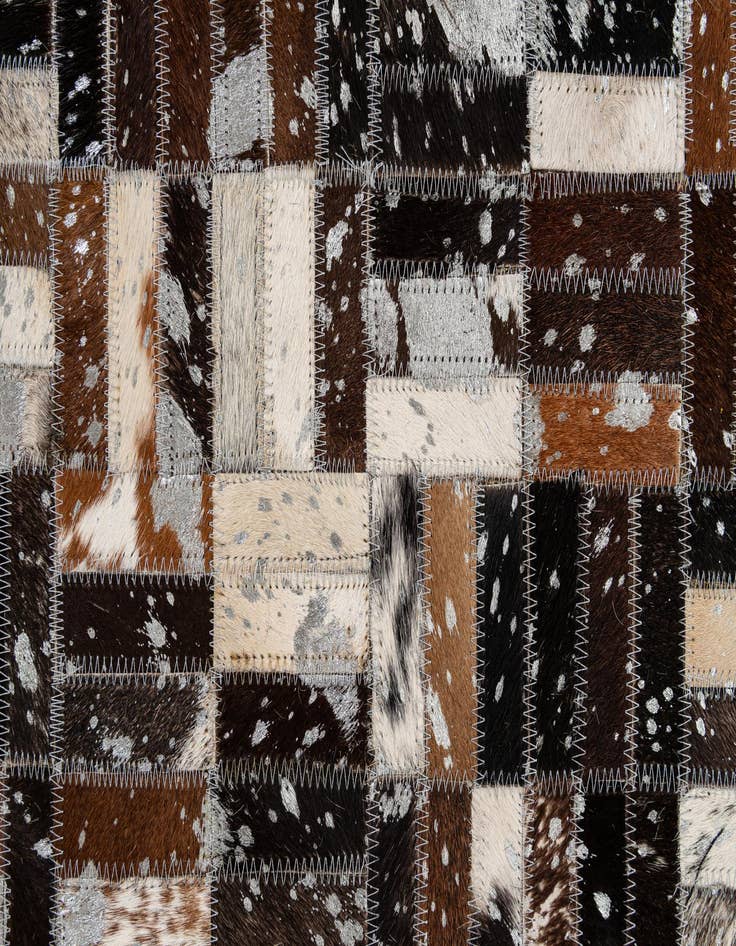 Detail image of  4' 11 x 7' 10 Cowhide - Patchwork Rug