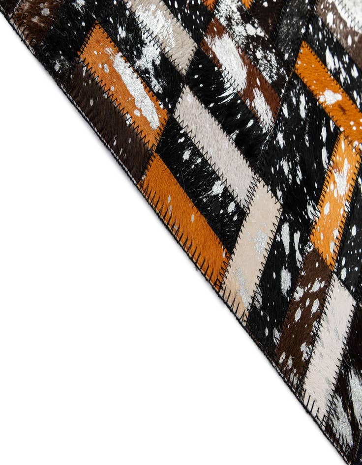 Detail image of  5' 1 x 8' 3 Cowhide - Patchwork Rug
