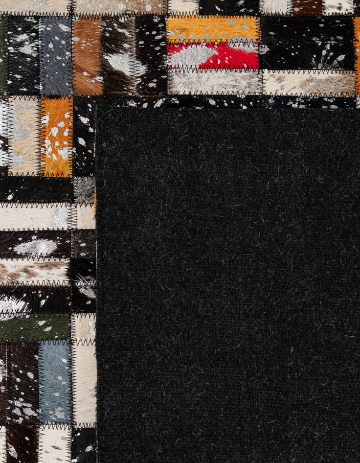 Detail image of  5' 1 x 8' 3 Cowhide - Patchwork Rug