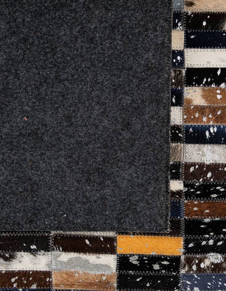 Detail image of  5' 1 x 8' Cowhide - Patchwork Rug
