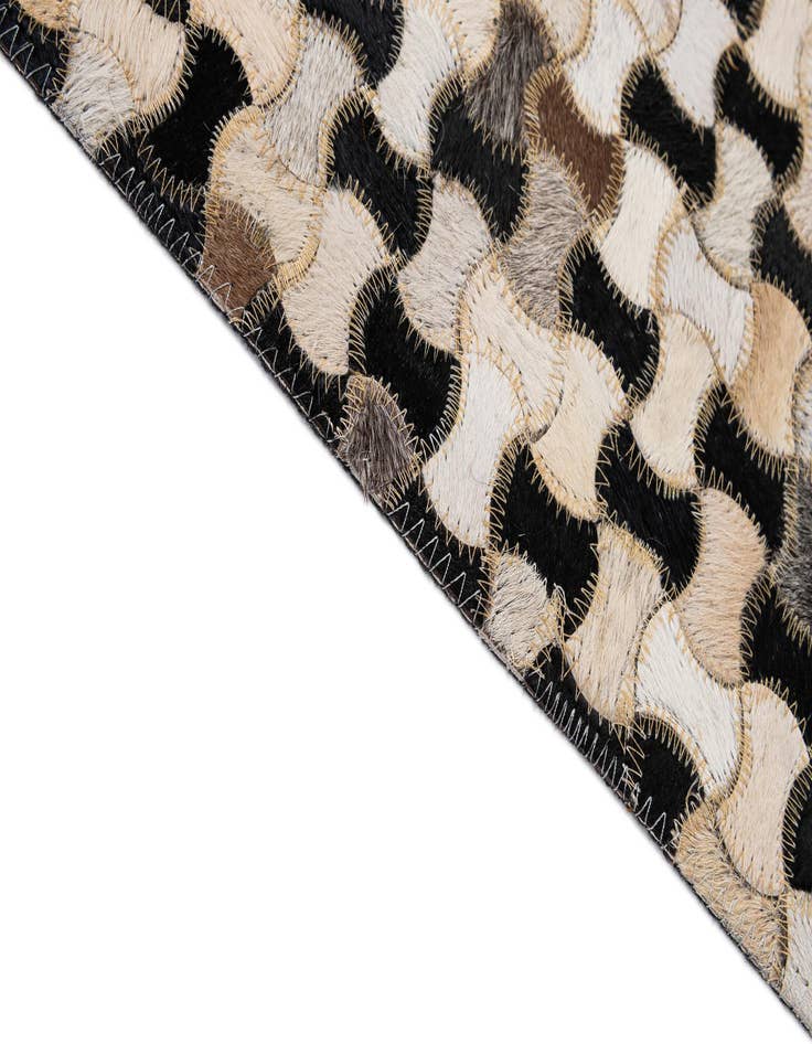 Detail image of  5' 1 x 8' 1 Cowhide - Patchwork Rug