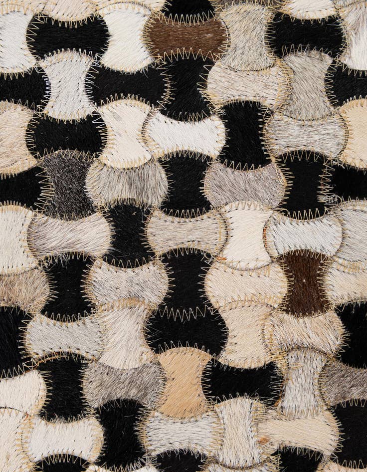 Detail image of  5' 1 x 8' 1 Cowhide - Patchwork Rug