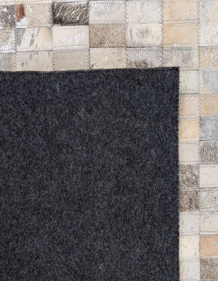 Detail image of  5' 3 x 8' 3 Cowhide - Patchwork Rug