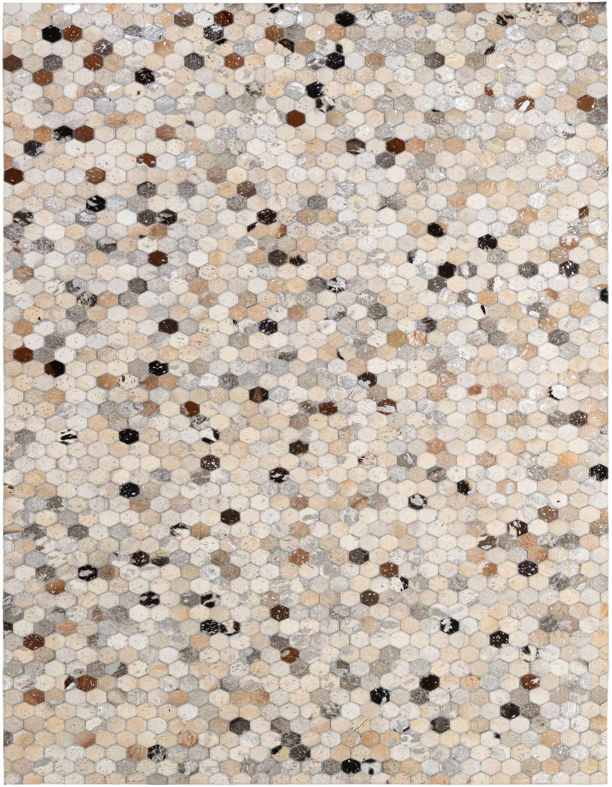 A 5x8 rectangular Cowhide Patchwork rug featuring a modern honeycomb pattern in multi-colored natural cowhide and leather.