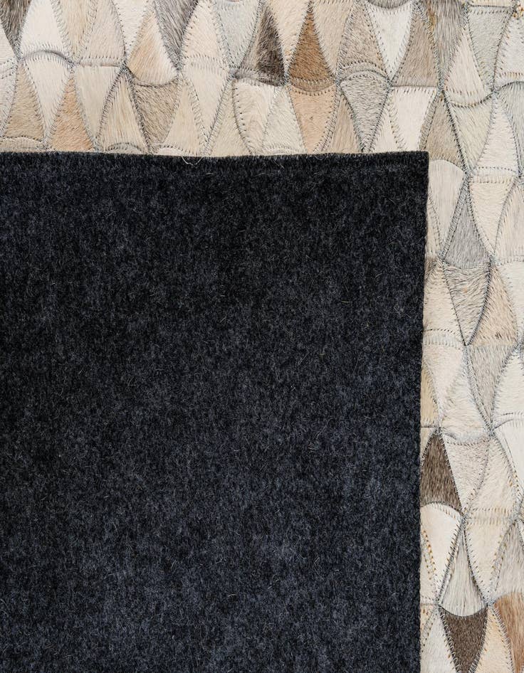 Detail image of  4' 11 x 8' Cowhide - Patchwork Rug