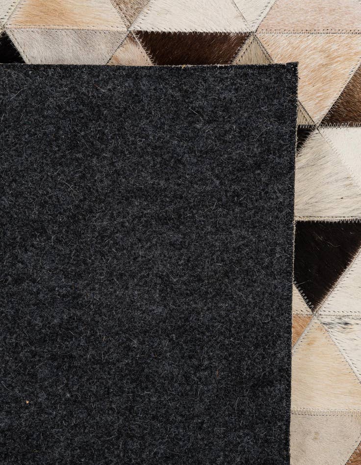 Detail image of  5' x 8' Cowhide - Patchwork Rug