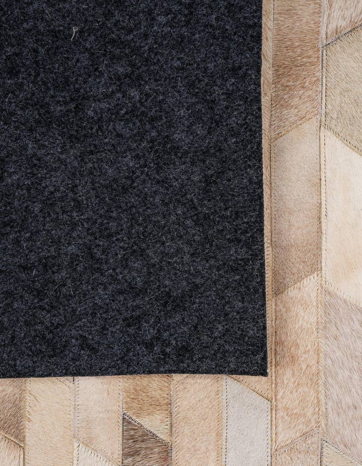 Detail image of  5' x 7' 11 Cowhide - Patchwork Rug