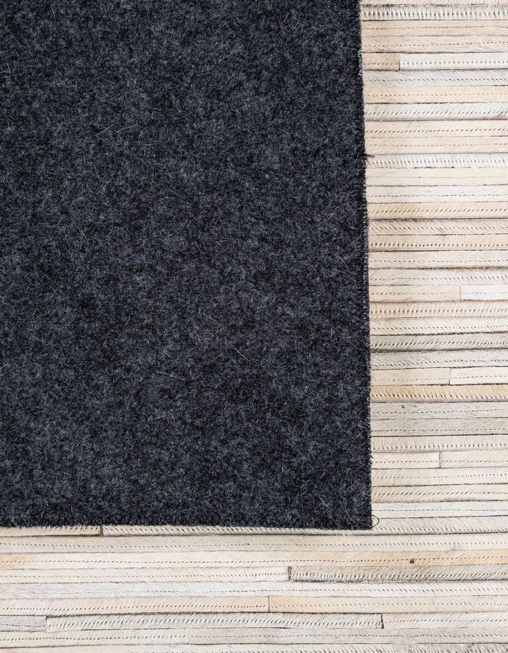 Detail image of  5' 1 x 8' Cowhide - Patchwork Rug