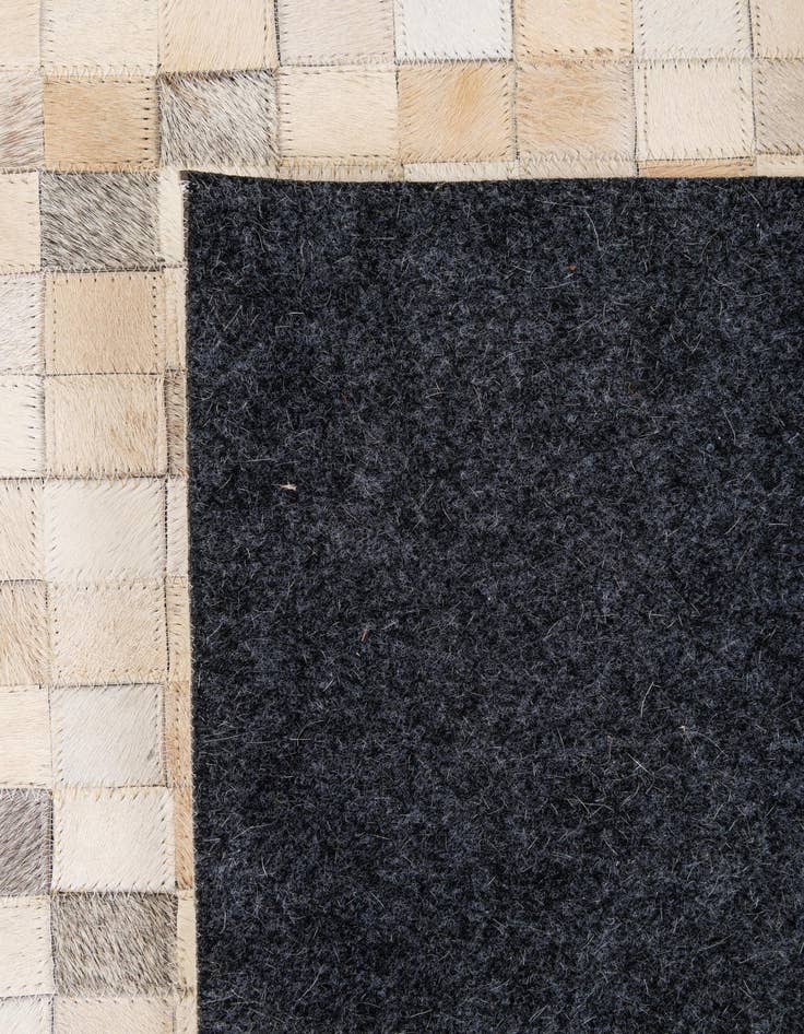 Detail image of  5' 1 x 7' 11 Cowhide - Patchwork Rug